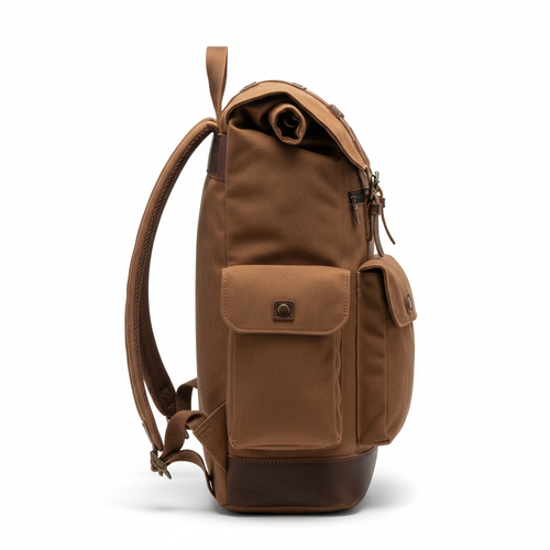 Brown backpack with front pockets and leather base on white background